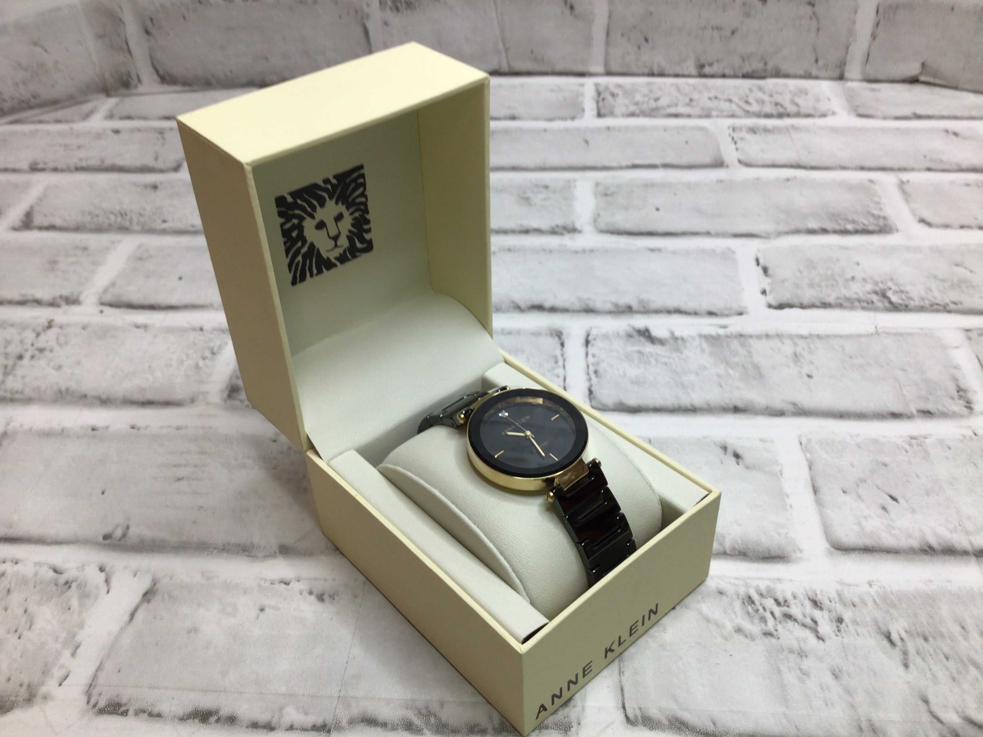 Anne Klein Women's Diamond Dial Ceramic Bracelet Watch Black/Gold (8079652978926)