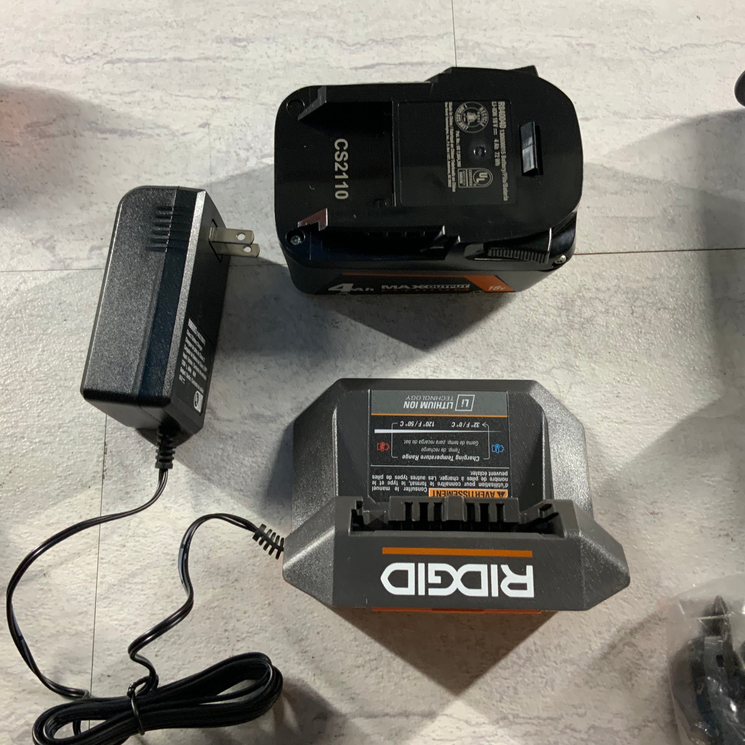 RIDGID 18V DEFECTIVE DRILL 4.0 Ah MAX Output Battery, 18V Charger, Tool Bag (7197565878510)