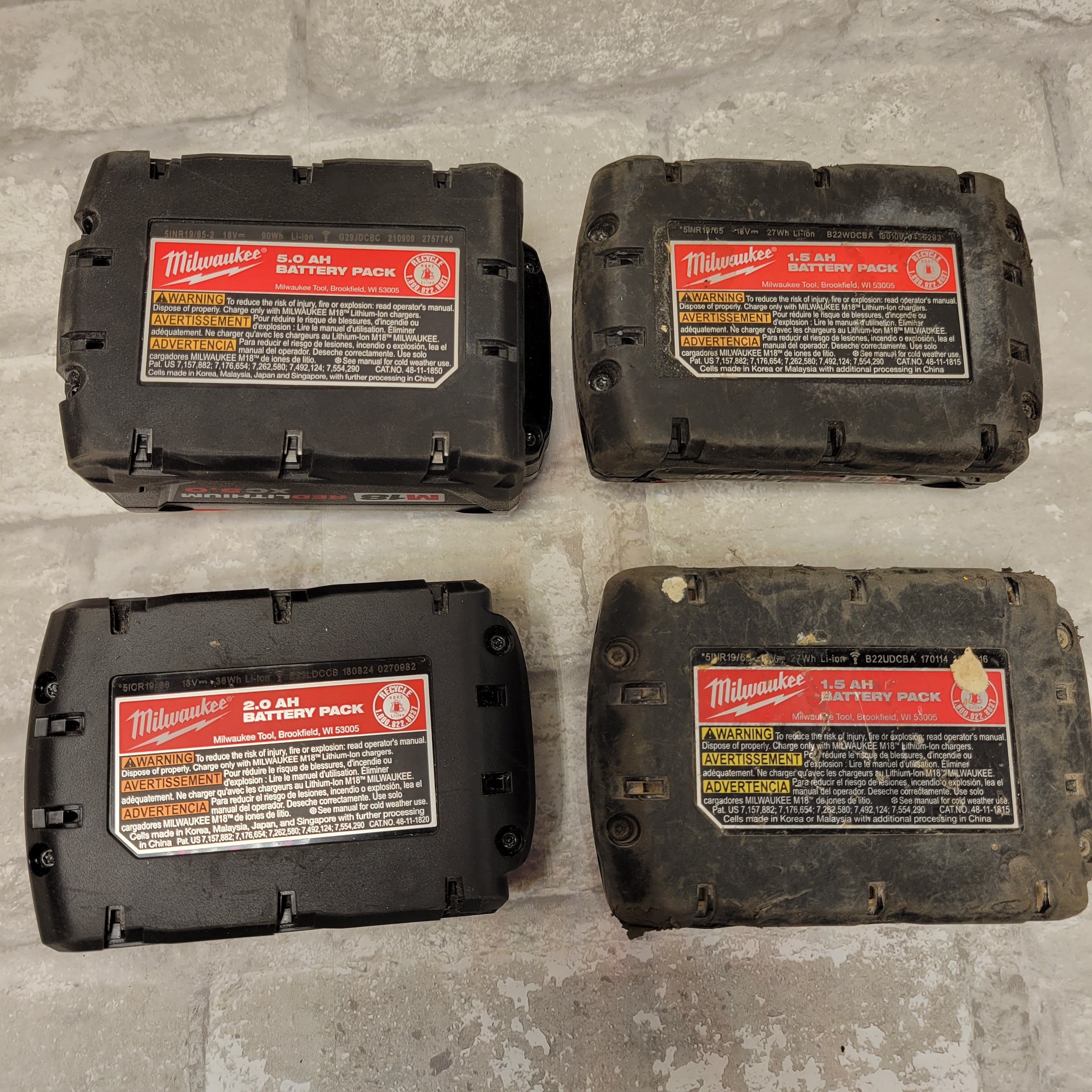 Milwaukee M18 Battery, Lot of 4, *FOR PARTS/DAMAGED* (7951524397294)