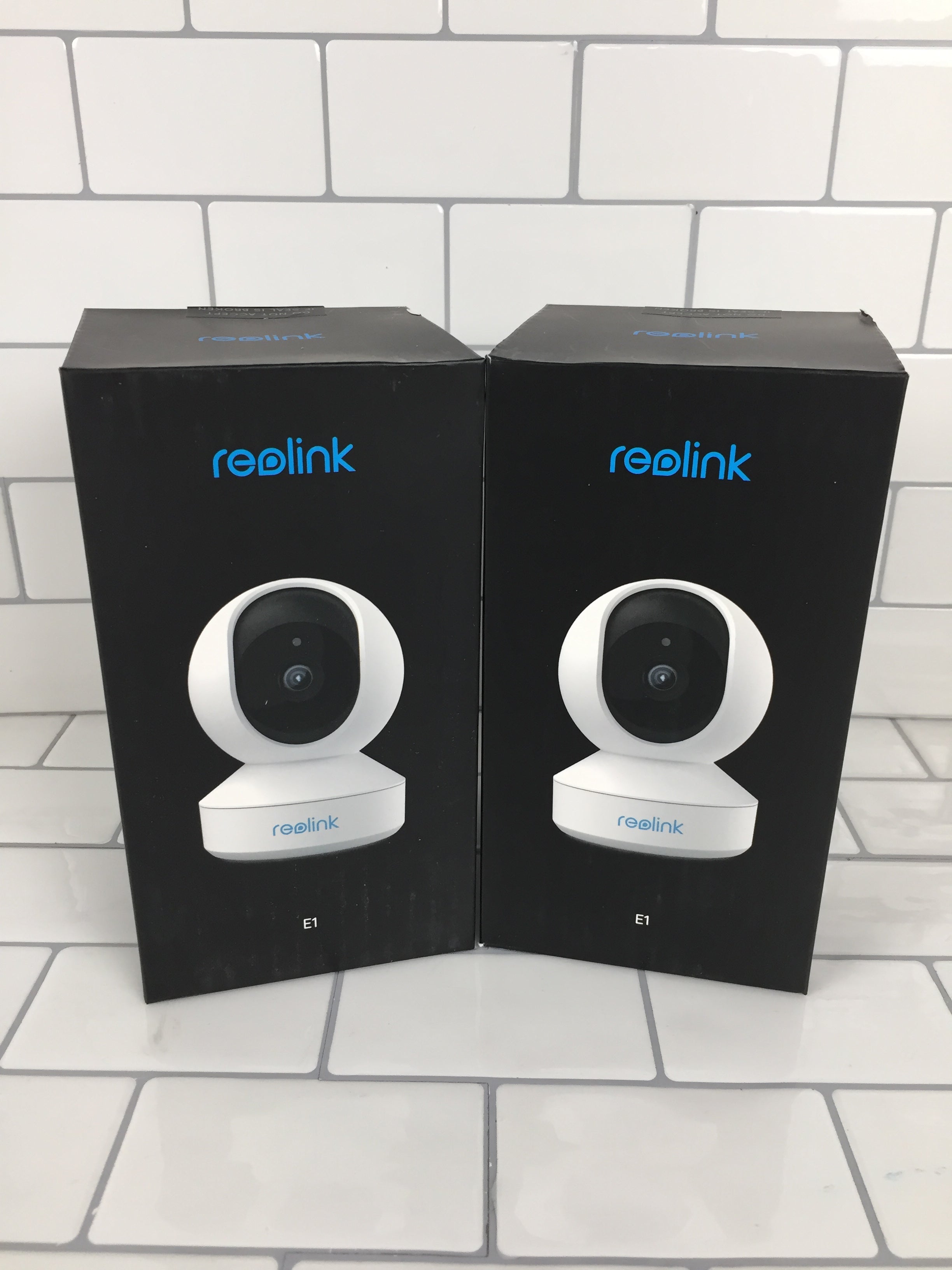 (2) Reolink Home Security Cameras | Plug-in Indoor WiFi Pan/Tilt 2 Way Audio E1 (7445389639918)
