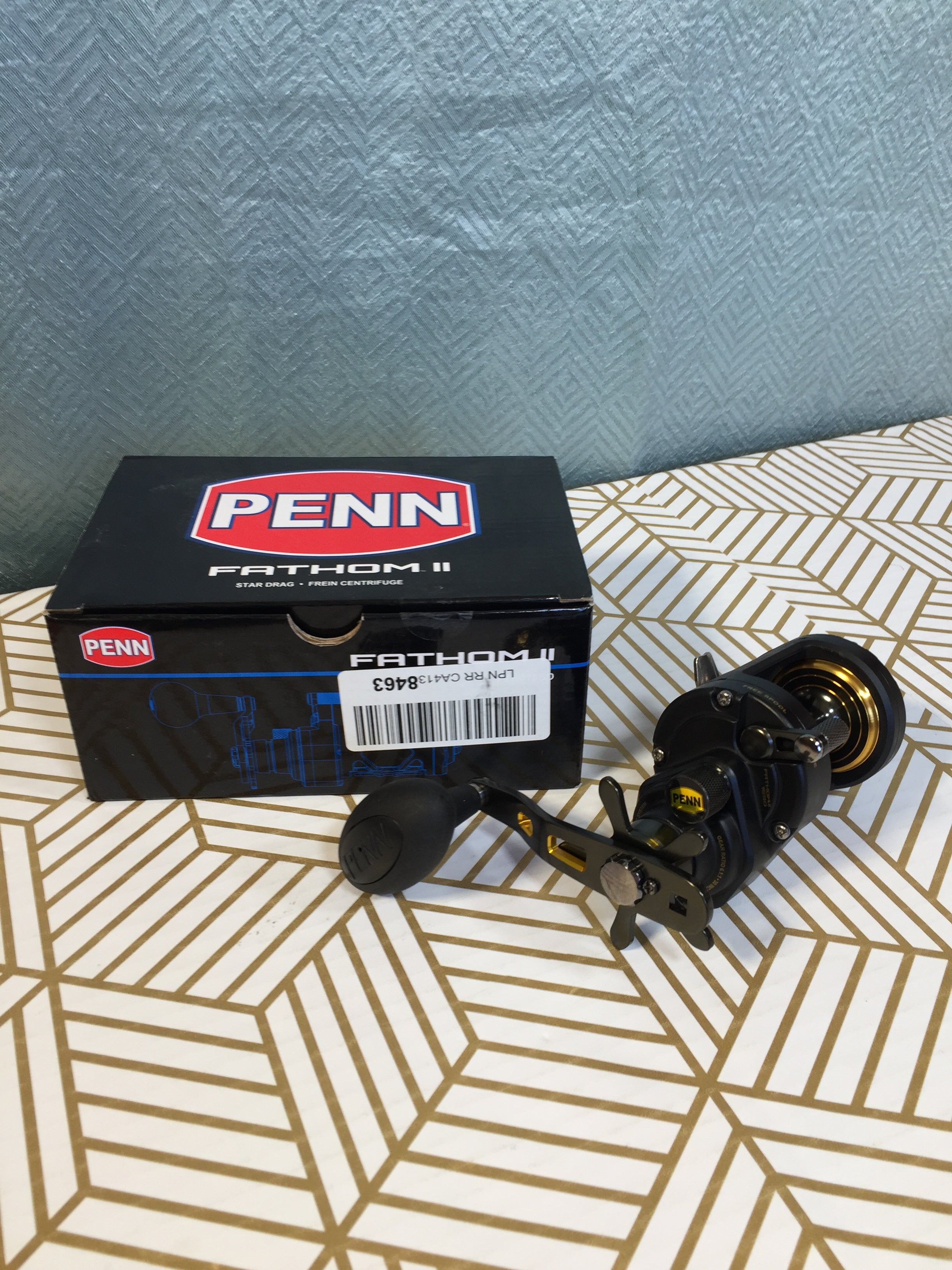 PENN Fathom II Star Drag Conventional Fishing Reel, Black Gold, 25N (7680425197806)